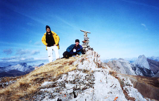What is the summit cairn pointing at?  Better yet, what is Sonny's toque pointing at??