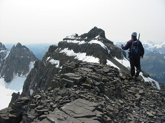 The true summit is not as far as it looks, but the connecting ridge has a lot of loose rocks.