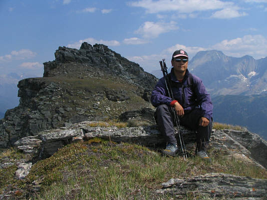 Some route-finding is required to get up a rock band guarding the third summit (it's lower down and not visible here).