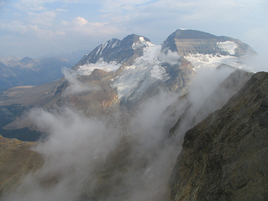 Look at me, I'm as helpless as a kitten up a tree; And I feel like I'm clinging to a cloud; I can't understand, I get misty, holding your hand.