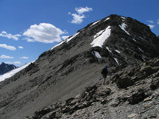 Perhaps the snow patch is covering the rest of the trail.