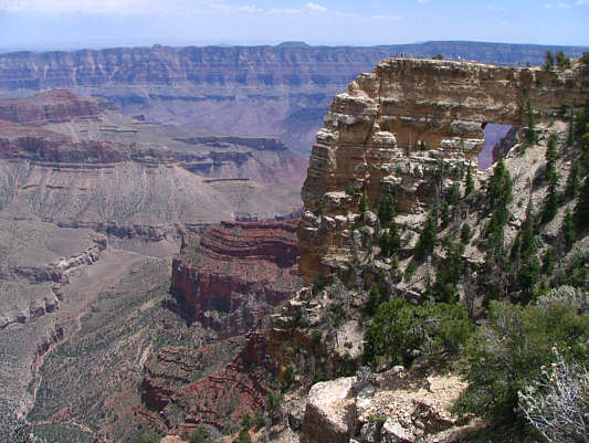 See the people on the terrace above the window?