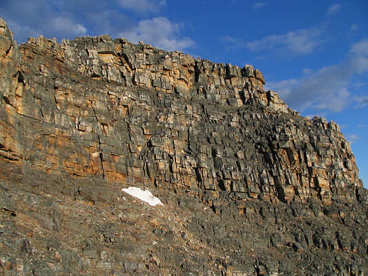 Traversing below these walls is feasible but requires some route-finding.