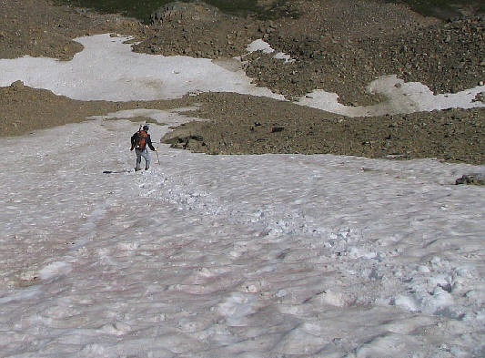 It's not easy glissading with a heavy backpack!