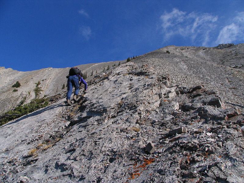 Because of foreshortening, the false summit is much farther away than it looks.