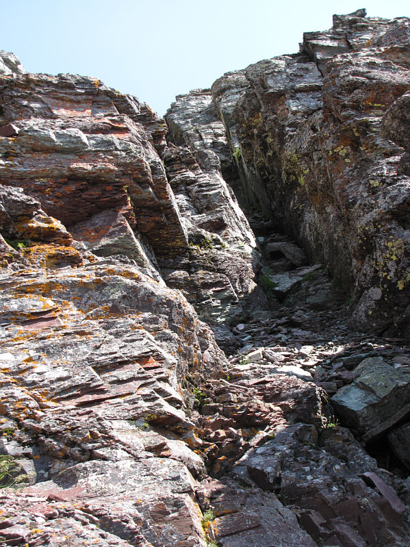 Go up for a bit and then escape out of the chimney to the left when feasible.