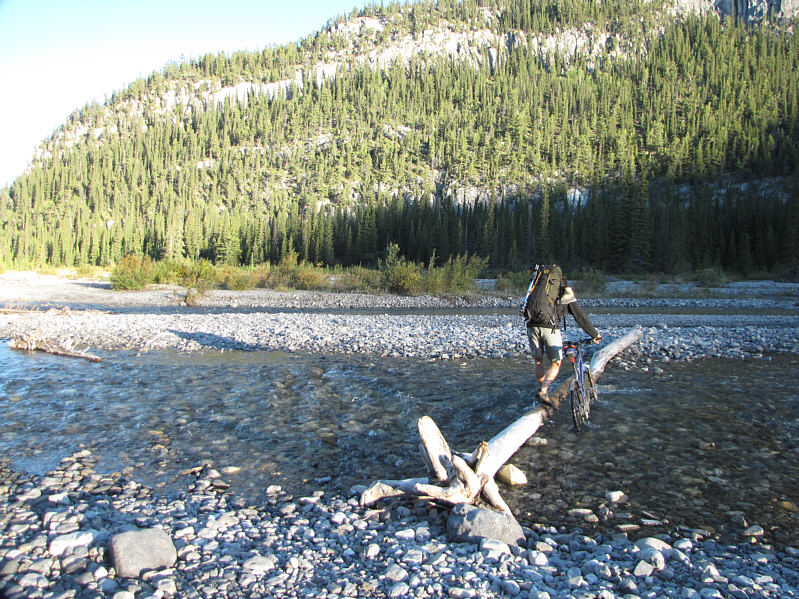 Keith is an avid mountain biker and even tried riding through the river!  How insane!
