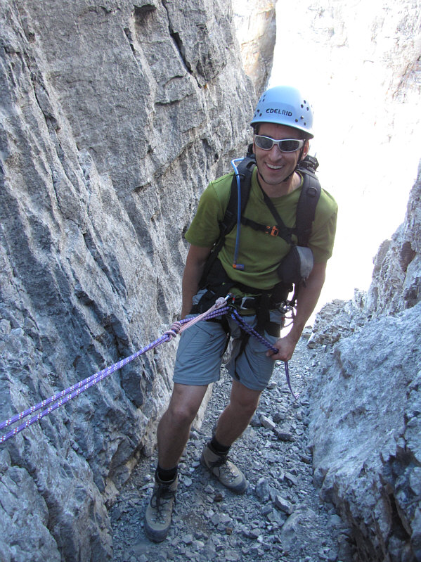 Note that he is using a Prusik knot backup.