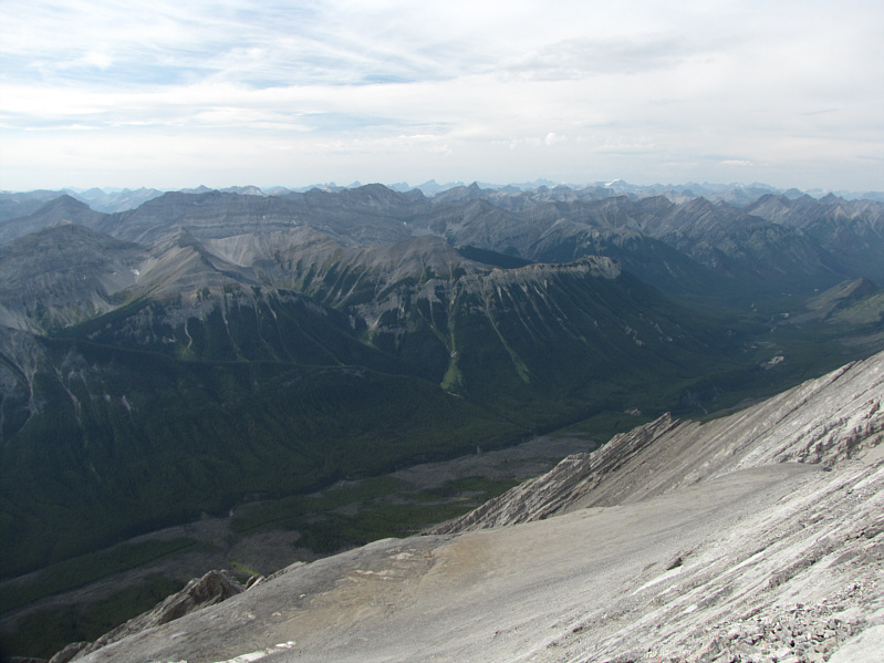The snow-capped peak on the horizon is Mount Ball.