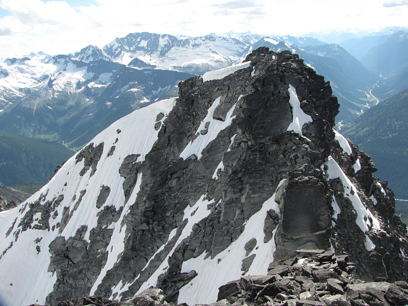 My GPS read 2858 metres on the west peak and 2869 metres on the east peak, but I think both peaks are roughly the same height.