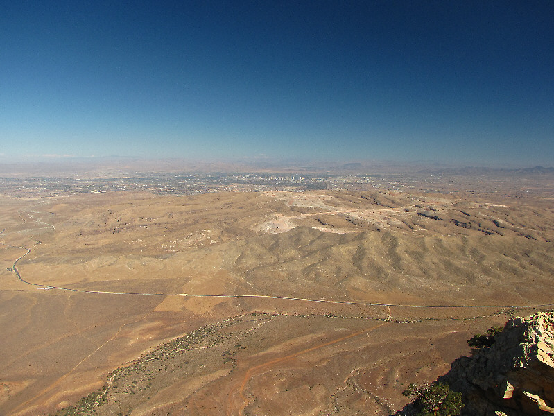 The lighter patches of Blue Diamond Hill are due to mining activities.