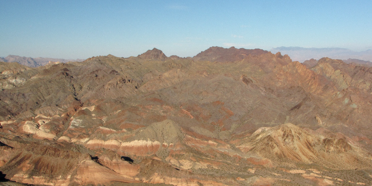 Actually, you're probably looking at "Mystery Cairn" and "Vista" Peaks. "Redstone" Peak itself is probably not visible here.