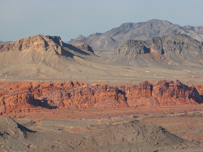 There is a technical climbing route in the red rocks at far left called Psycho Snail (5.10b).