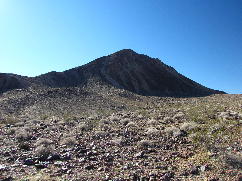Climb up to the saddle and turn right. Easy.