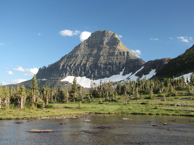 That diagonal ledge across the north face is actually a part of a Class 3 ascent known as the Grand Tour Route.