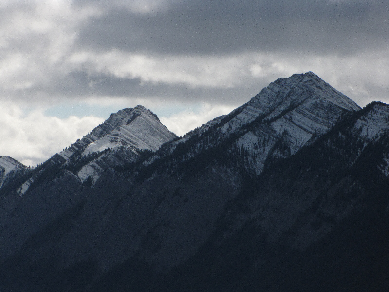 I think the peak on the left is the true summit.