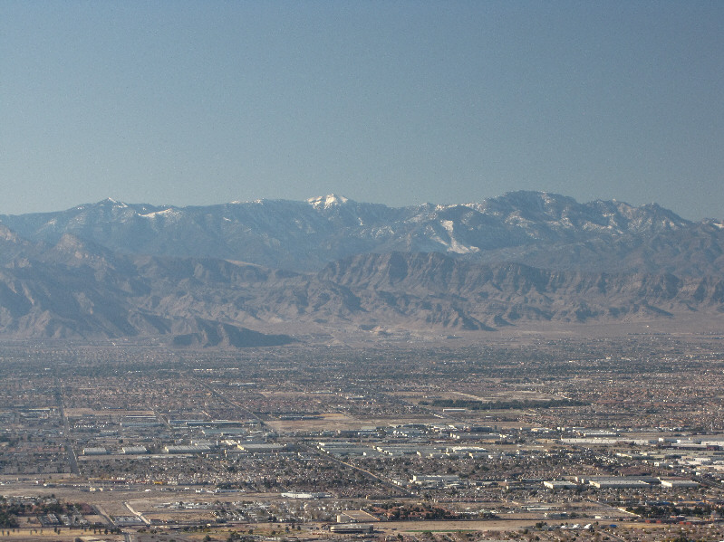 Charleston Peak is the snow-capped one at centre, and to the right is Mummy Mountain.