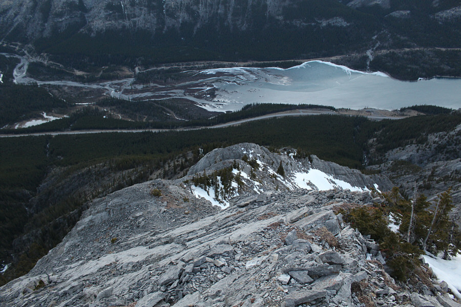 You're pretty much committed at this point to keep climbing up!