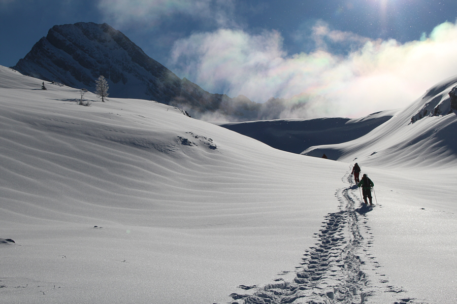 Matt is so careful not to tramp on the ski tracks with his snowshoes, but in open terrain like this, it hardly matters.