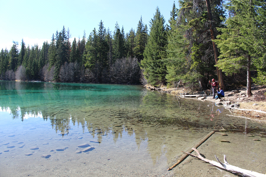 A couple of aluminum boats were chained up nearby.