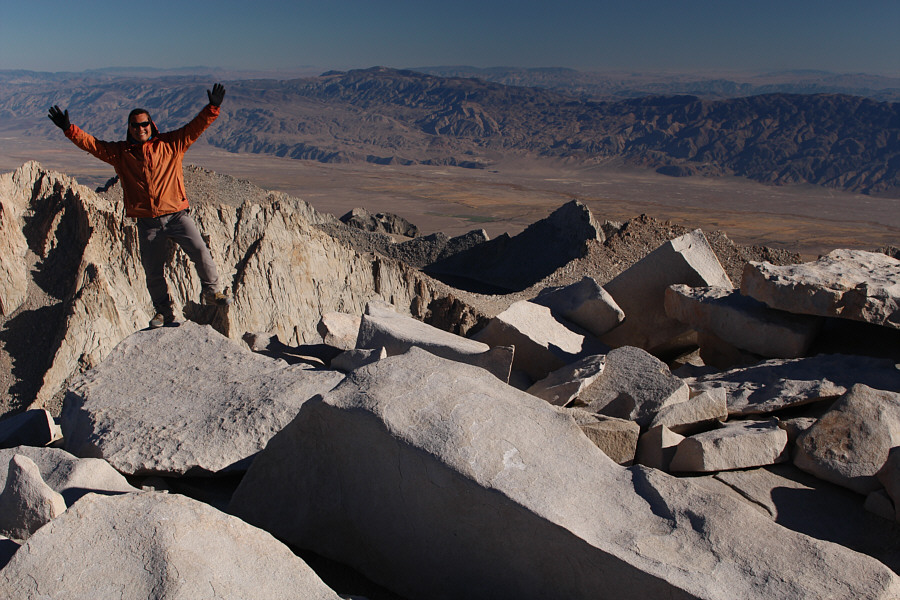 Don't worry; the rock is stable. Not sure about the person...