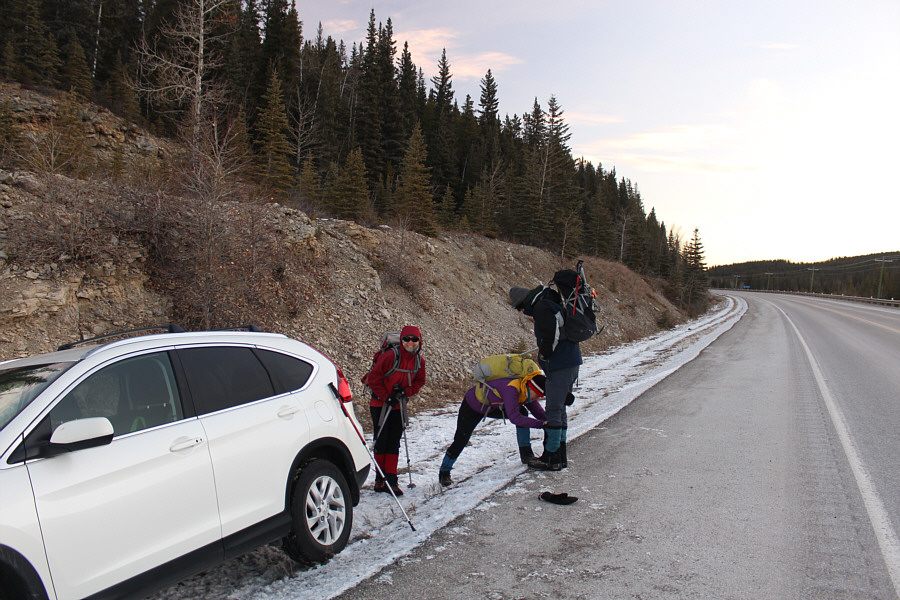 The mother is dressing up the kid!
