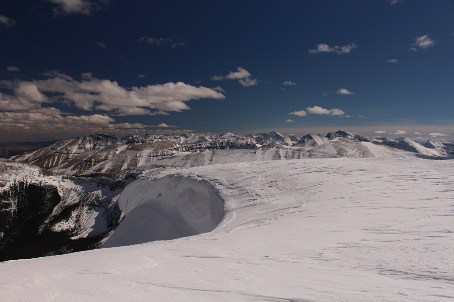 You should be able to pick out Mount Cleveland and Mount Blakiston, the highest peaks in their respective parks.