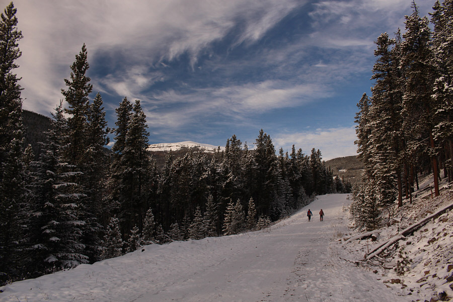 The road looks tempting to ski on, but the snow is still a bit too thin.