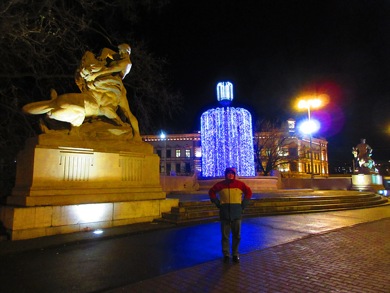 Don't mind the guy reaching into the lion's mouth...