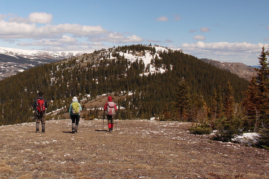 The southern high piont is lower but has better views.
