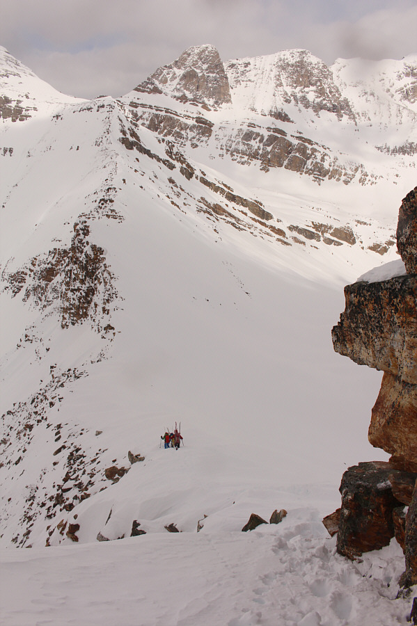 It's a bit awkward descending steep snow with skis strapped to your back!