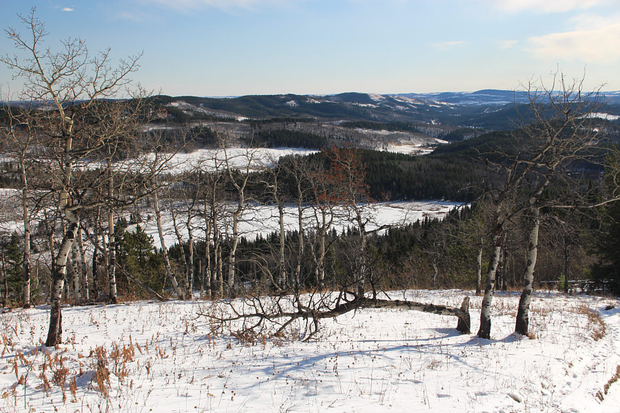 There's a huge mansion just beyond the K-Country border on the far side of the lake.