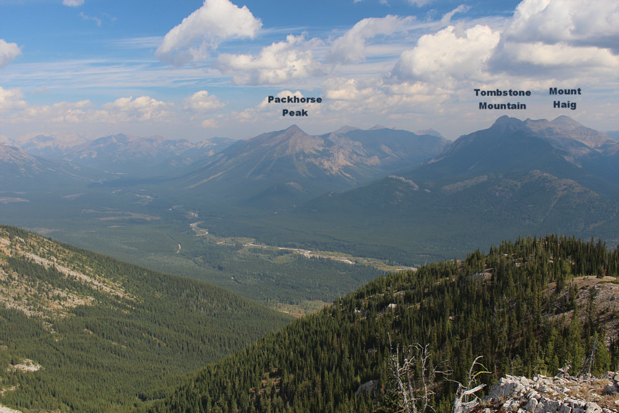 I wonder if there is a route up Tombstone Mountain from this side...