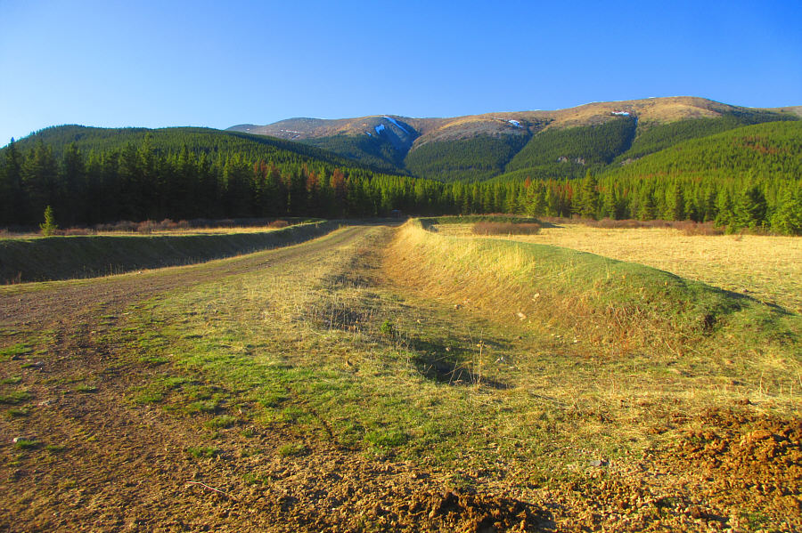The outhouse here is functional but in very poor shape.