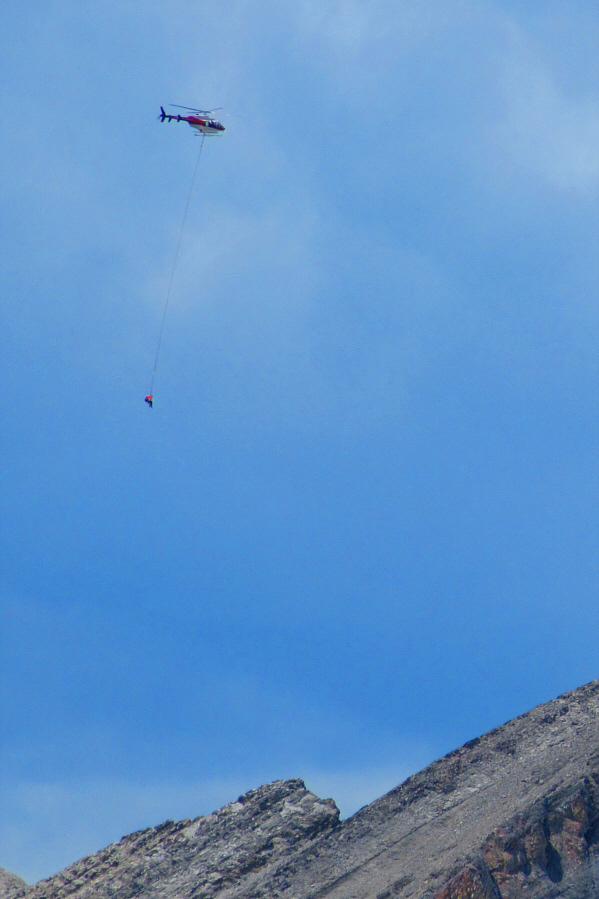 I think I would have a heart attack just dangling like this under the helicopter!