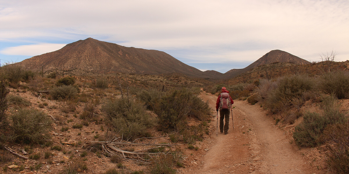 The road does NOT go all the way to the gap between the two mountains!