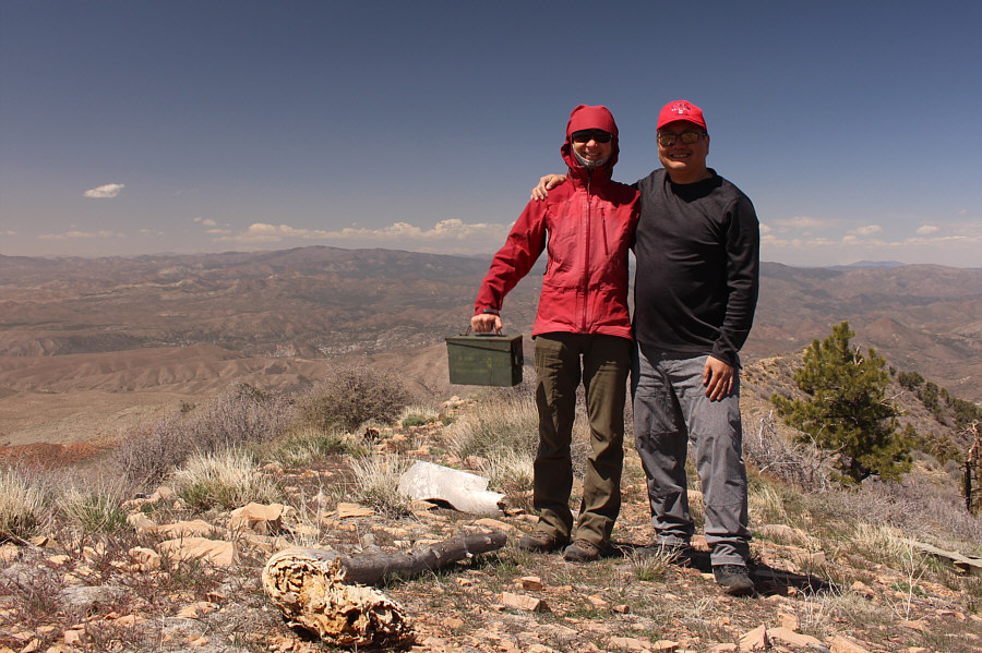 The actual summit is somewhat bushy and less scenic than this spot.