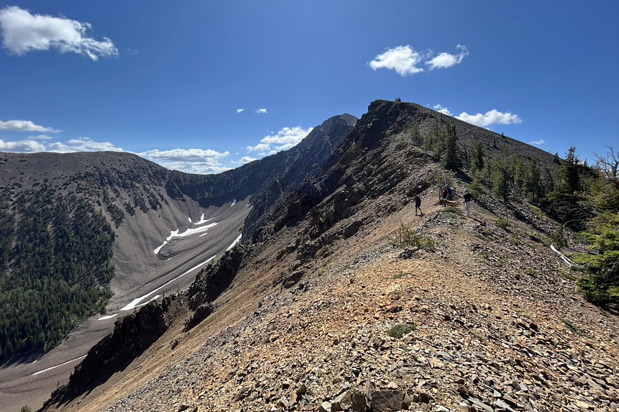 Already scoping a different way down the horrible scree slope...