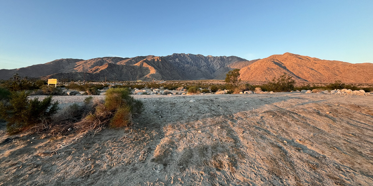 The foreground is a popular place for visitors to "walk" their dogs.