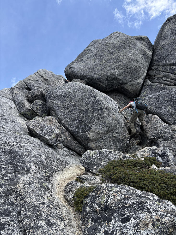 Should be going climber's right (out of the photo) instead.